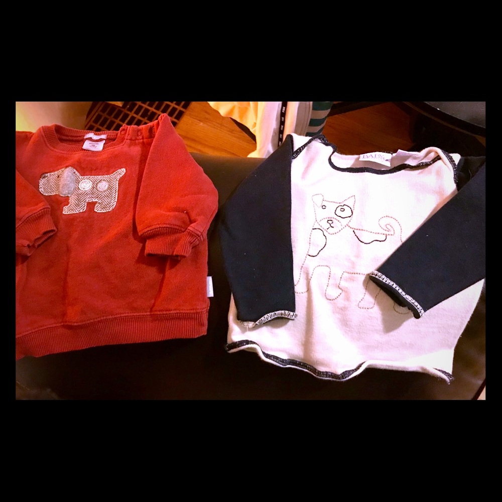 Two adorable, doggie inspired, baby shirts.